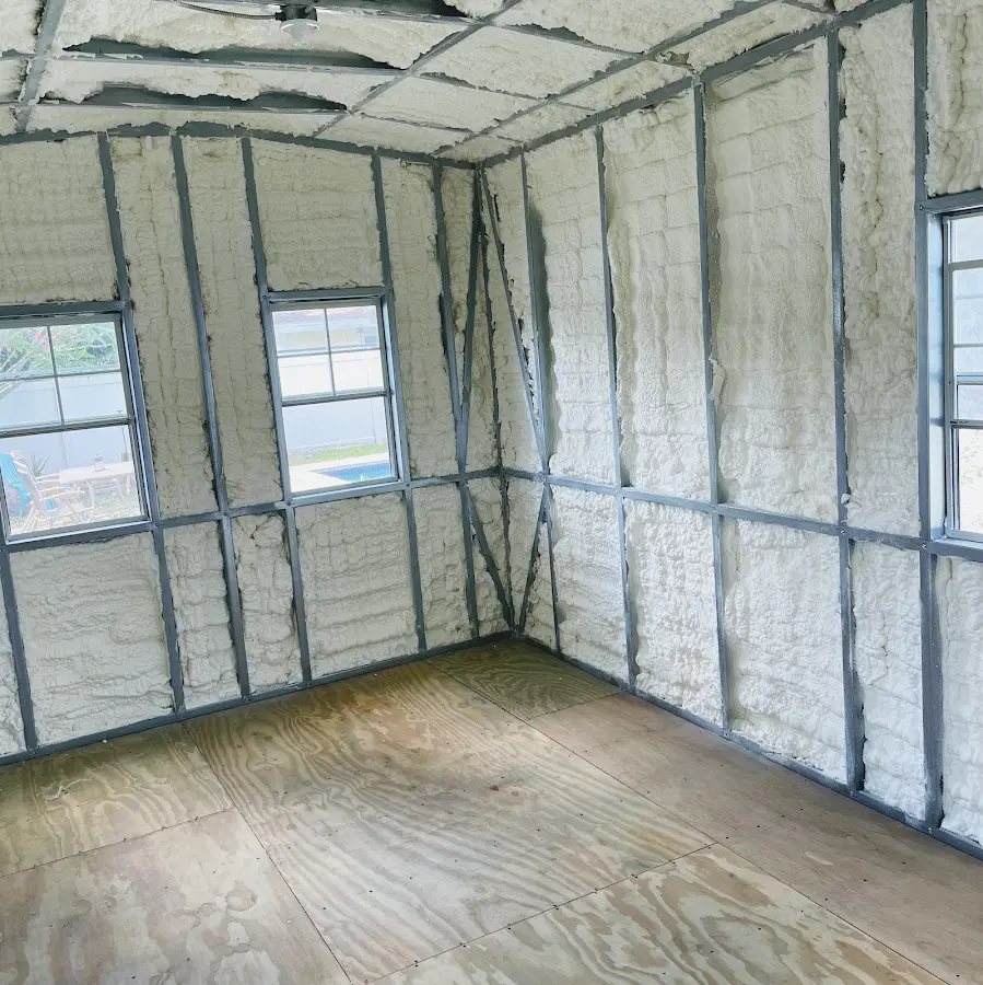 Closed-cell spray foam insulation applied to wall cavities in a residential project in Treasure Island